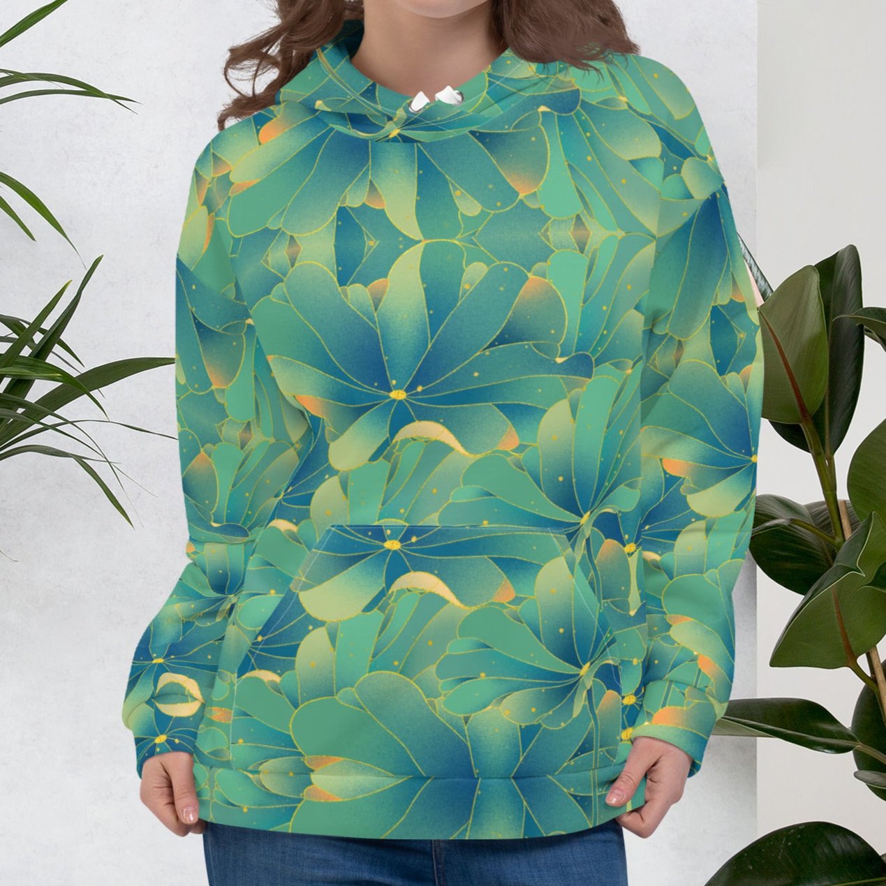 Water Lettuce Green Beach Hoodie, a cozy unisex sweatshirt with a vibrant green and turquoise water lettuce print, soft cotton-feel fabric, and brushed fleece lining, perfect for beach strolls and lounging.